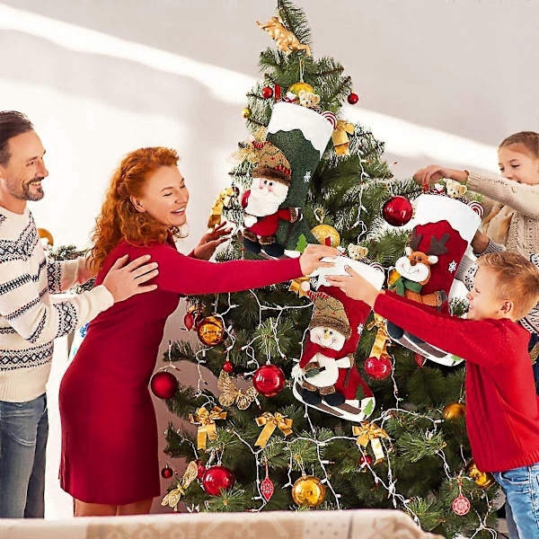 3-delars set julstrumpor 45,7 cm (ungefär), med 3D jultomte, snögubbe