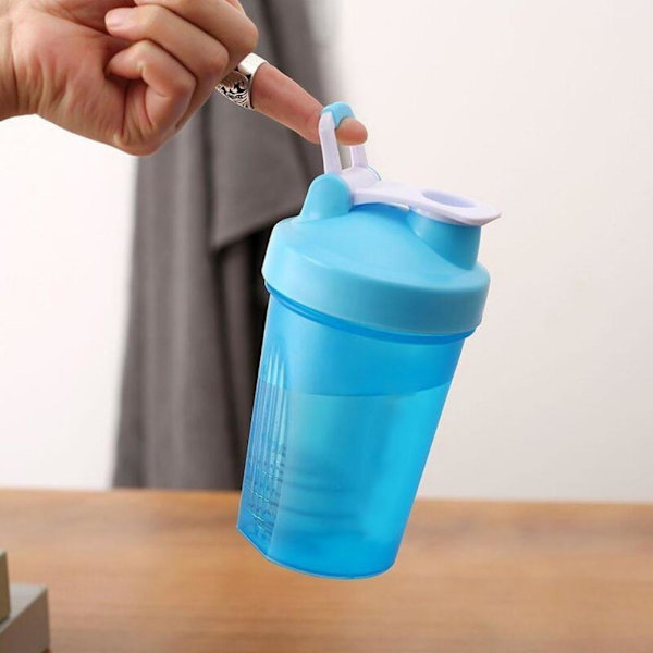 400 ml proteinshakerbehållare fitness sport vattenflaska med skala läcksäker kittel innehåller öglelock och rostfri vispboll