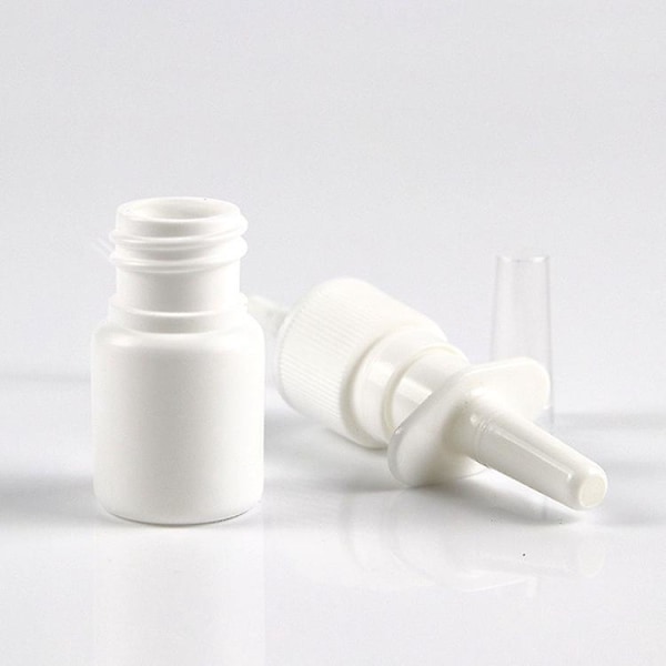 1 tyhjä muovinen suihkepullo valkoisella korkilla 5ml