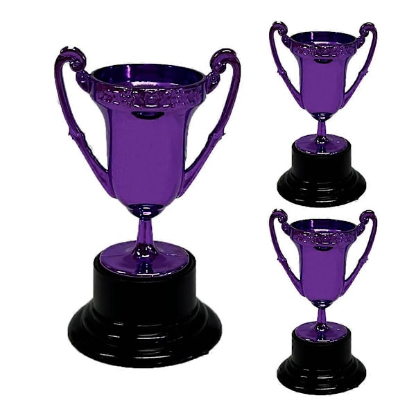 Plasttroféleksaker lila guldpläterad dekoration