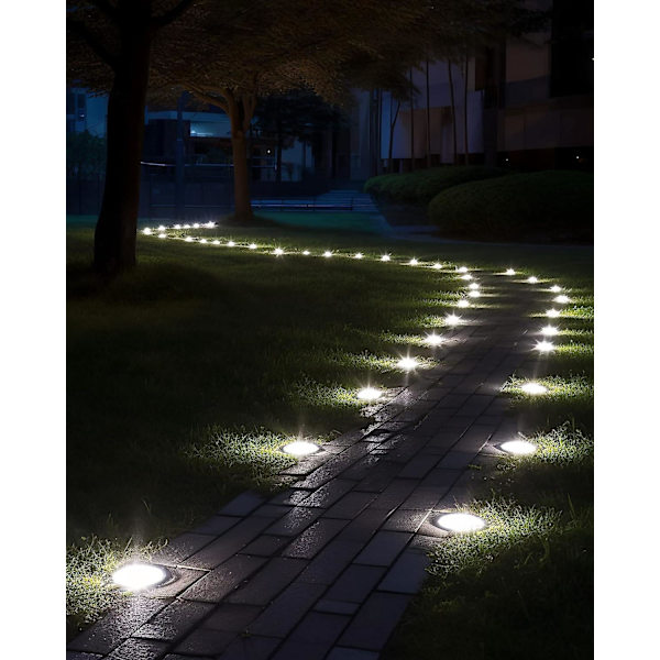 Aurinkoenergialla toimivat ulkokäyttöön tarkoitetut maavalot, 4 kpl, kirkkaat 12 LED-valoa, vedenpitävät, litteät polkuvalot