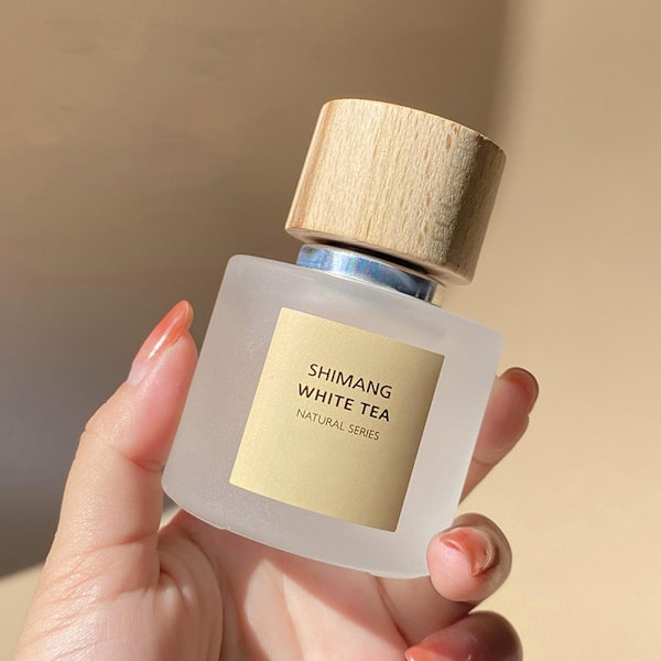 Naisten hajuvesi 50 ml Natural Series Pitkäkestoinen Kevyt Aromi Puinen Cover Pyöreä Pakkaus Alumiini Sprinkleri Naisten Hajuvesi Valkoinen Tee