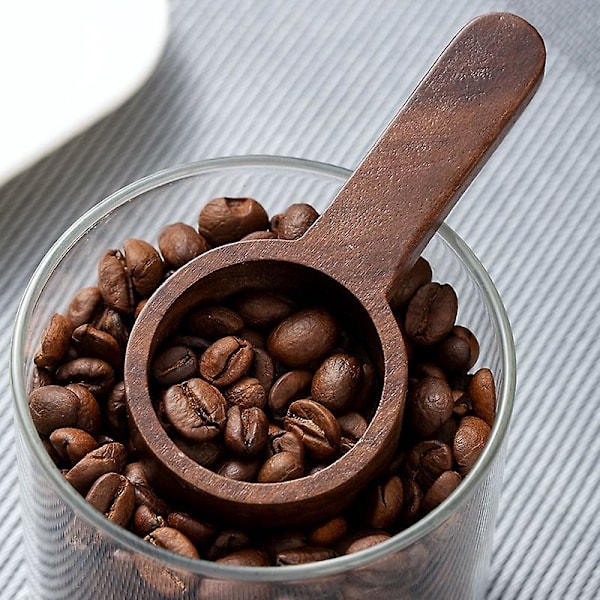 Mätningsskedsset i svart valnötsträ för malda kaffebönor och te