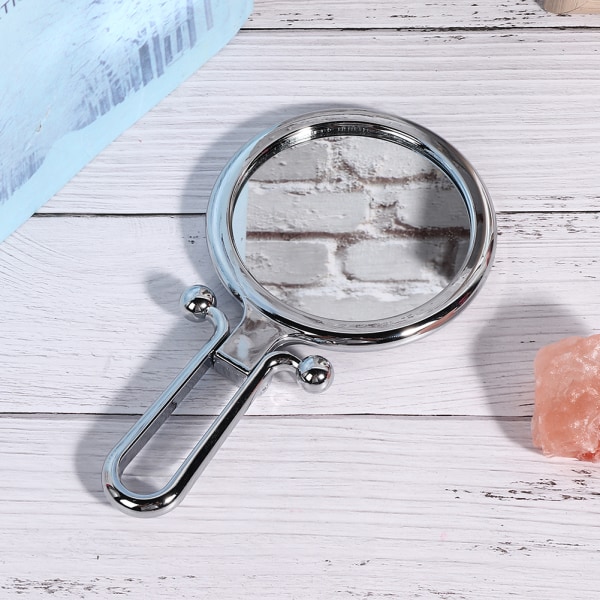 Dobbeltsidet makeup-spejl 10x forstørrelse, foldbart håndholdt kosmetikspejl til hjemmerejser (sølv)