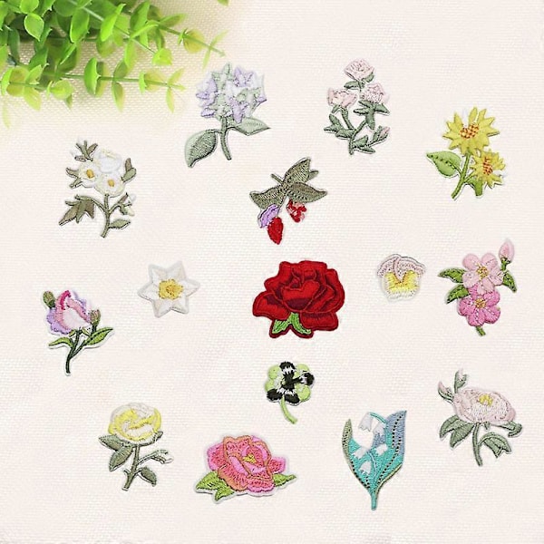 Et sett med 15 databroderte blomster Zhangzi japanske små blomsterlappklistremerker broderi tøy klistremerker klesdekorasjonsreparasjon