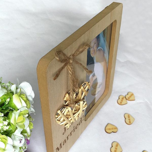 Klassisk trefotoramme med 10x15 cm feste og 20x15 cm massiv treramme
