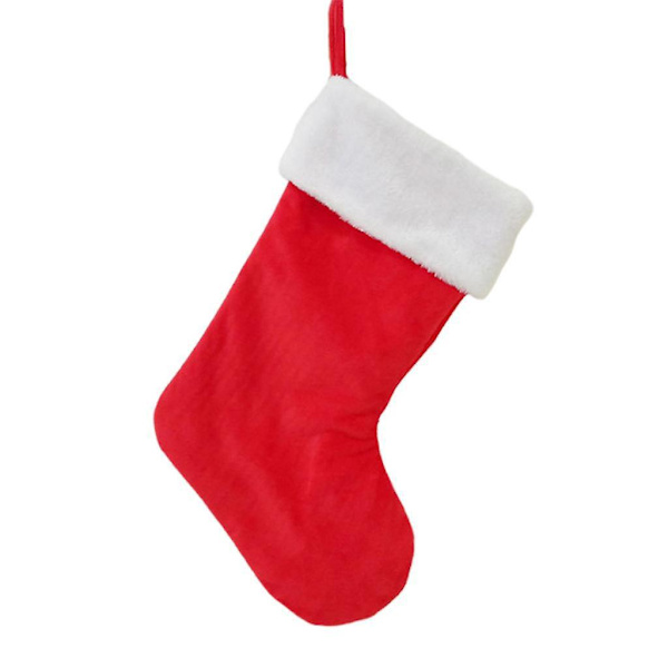 Klassisk röd och vit julstrumpa i sammet för juldekoration