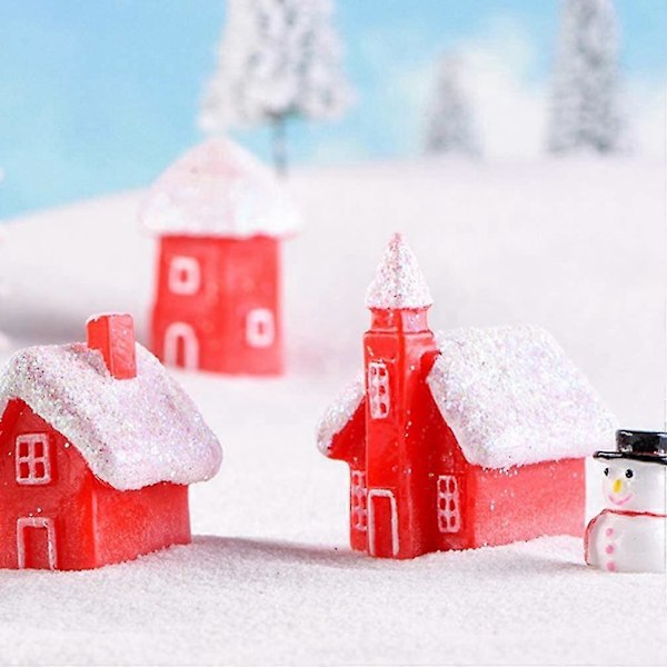 Mini Julbyhus skimrande snövilla dekorerad med 4 dockor
