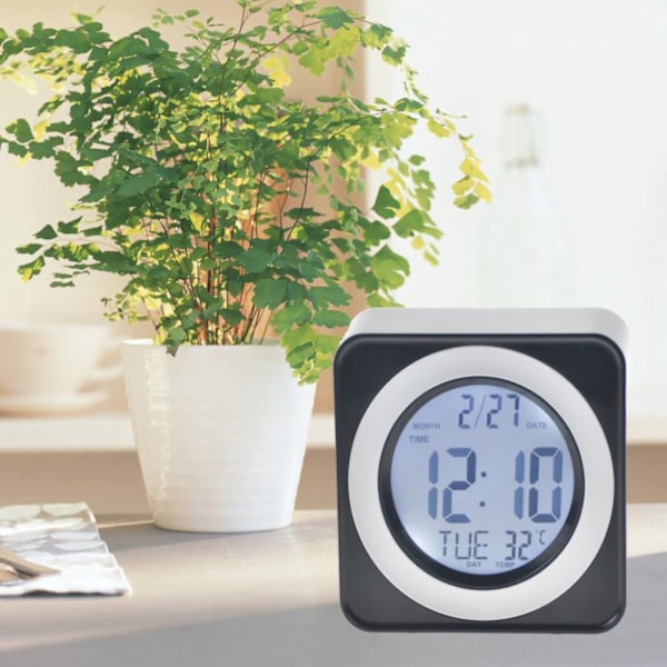 Stemmestyret baggrundsbelyst LCD-ur firkantet elektronisk ur med kalendertemperaturvisning sort