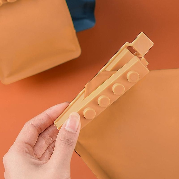 12 plastförslutningsklämmor, matpåseklämmor, chipsklämmor, matklämmor