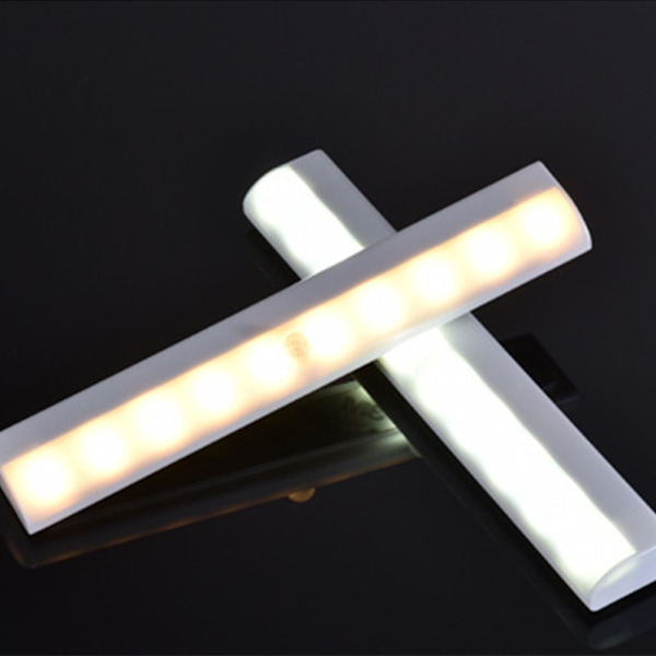 Bevegelsessensorlys med høy lysstyrke LED-lyskontrollsensor Skap Garderobe Lampe for soverom Gult lys (varm hvit)