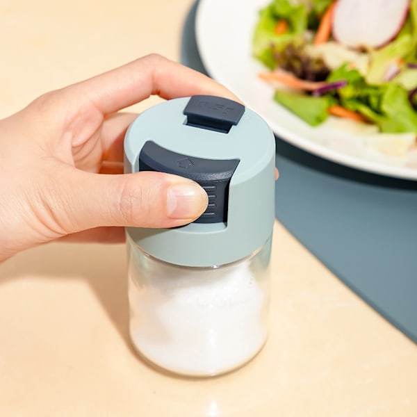 Trycktyp Salt Shaker Kryddburkar med lock Tät Dammsäker Kryddburk Glasflaska Köksredskap