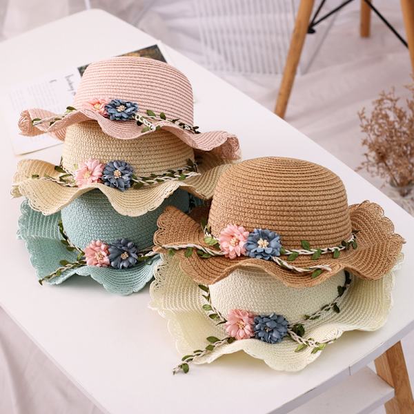 Barnblommig solhatt med spetskant och strandväska