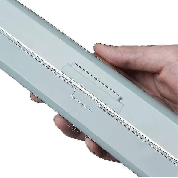 Plastfoliedispenser och skärare. Plastfoliedispenser. Matfoliedispenser. 5 x 5 x 32 cm
