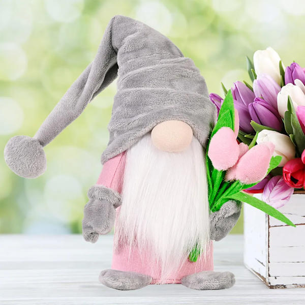 Forårsnisse pyntet med tulipanbuket, forårsdekoration, håndlavet plysdukke uden ansigt