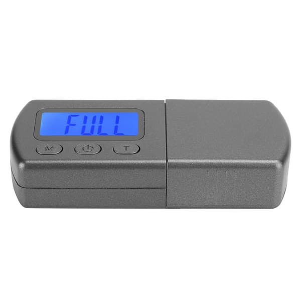 Digital skivspelare med LCD-display, nåltrycksvåg och kalibreringsvikt.