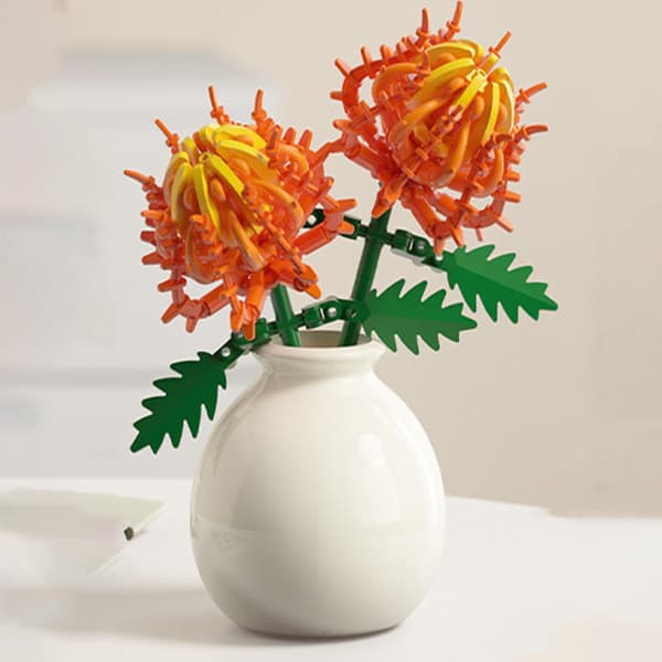 Miniature blomsterbyggeklodser, blomstrende planter lavet af byggeklodser (tornet krysantemum)