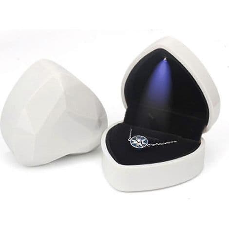 Denna LED-upplysta smyckesask är gjord av elegant sammet.