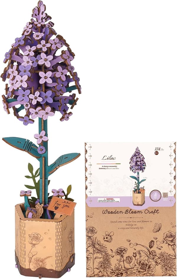 Dekorativt trepuslespill med kunstig blomst