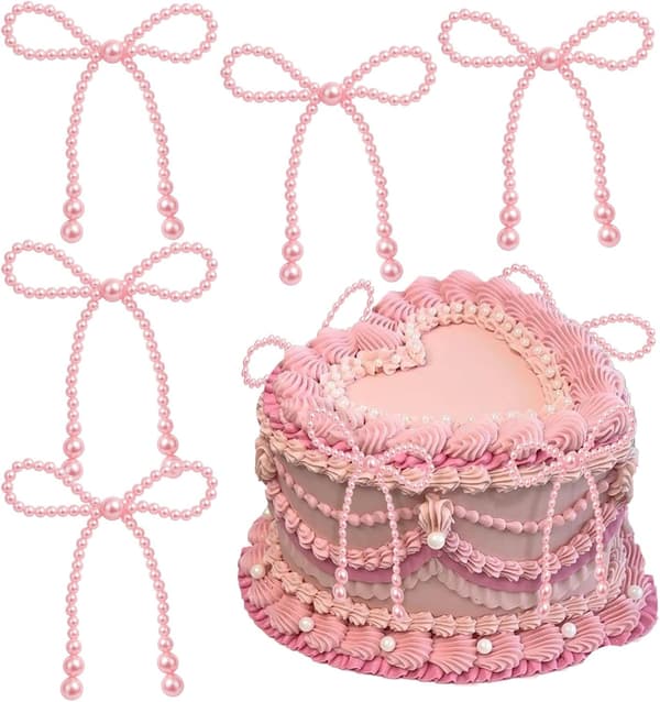 12 rosa pärlbågsformade tårtdekorationer