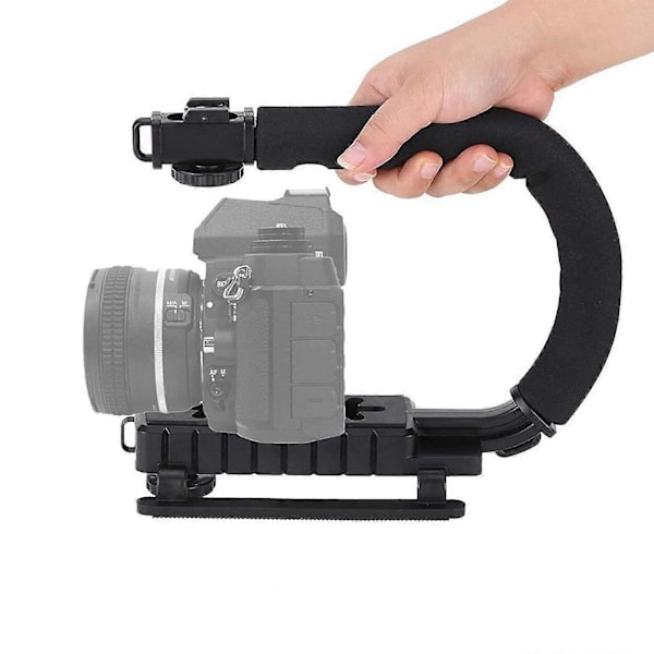 Videostabiliserande handtag, med blixtskofäste